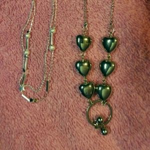 Two silver ankle bracelets